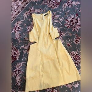 Zara yellow cut out dress.